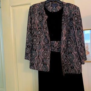 Cocktail dress decorated with glitter so do note that some will falloff.